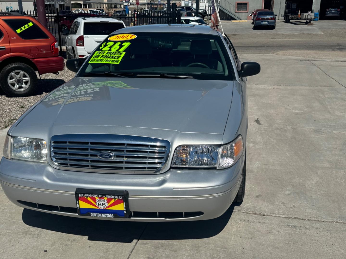 2003 Silver Ford Crown Victoria (2FAFP74W53X) , located at 2190 Hwy 95, Bullhead City, AZ, 86442, (928) 704-0060, 0.000000, 0.000000 - 2003 Ford Crown Victoria LX 2 owner clean title. Super clean. Completely serviced. ice cold a/c. Free Warranty. In house financing. - Photo#2